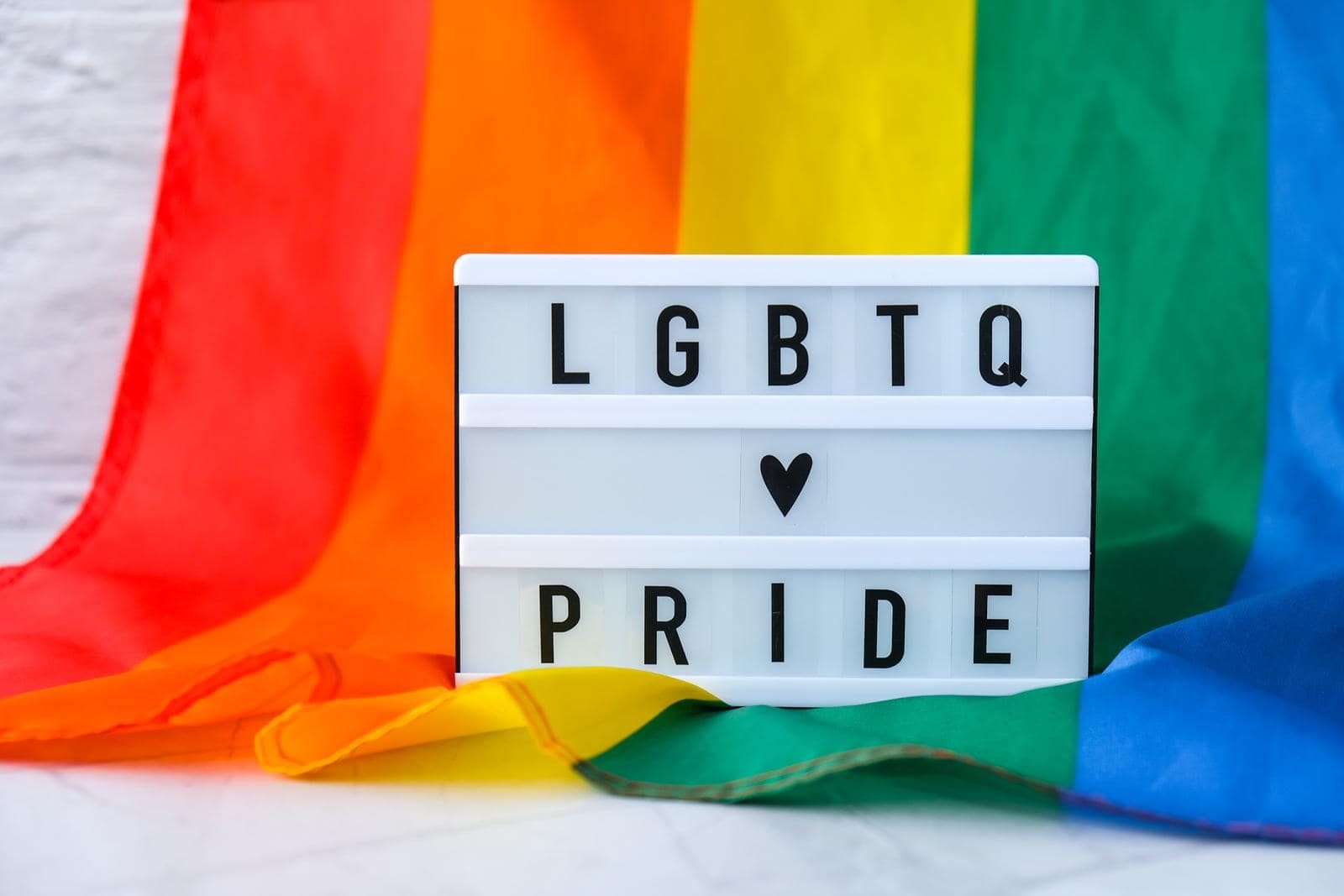38514154_rainbow-flag-with-lightbox-and-text-lgbtq-pride-rainbow-lgbtq-flag-made-from-silk-material-symbol-of-lgbtq-pride-month-equal-rights-peace-and-freedom-min LGBTQ and the Indian cinema