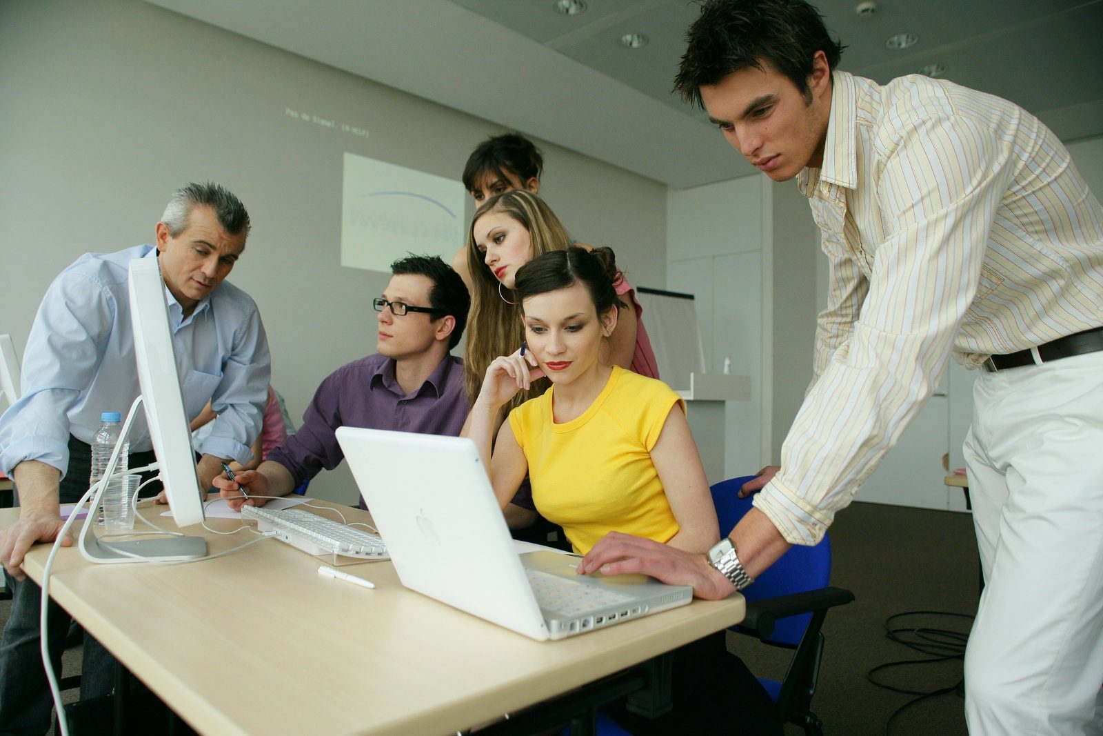5644712_business-team-having-productive-meeting-min Business team having productive meeting